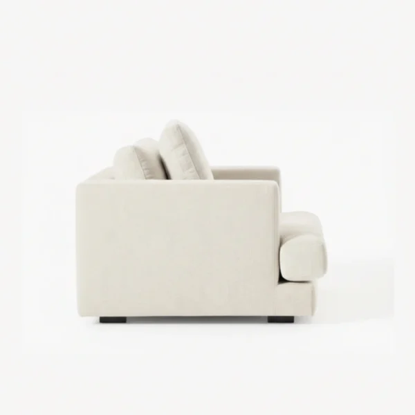 Velora Soft Armchair - White (5) side profile view of white fabric armchair
