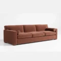 angled view of brick red 3 seter sofa