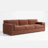 angled view of brick red 3 seter sofa
