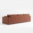 reaer view of brick red 3 seter sofa.