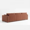reaer view of brick red 3 seter sofa.