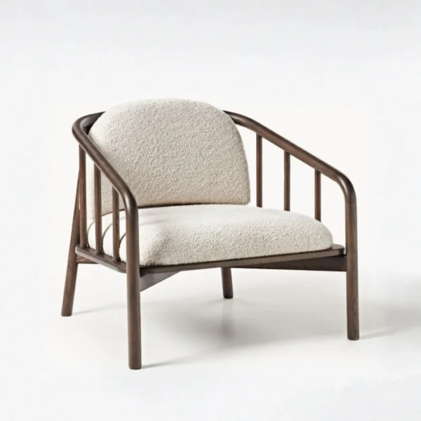 WoodLuxe Armchair (2) Angled view of wooden armchair with beige cushions