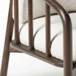 close view showing wooden arm