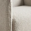 Close-up of the AirCush seat cushion, arm seam and textured upholstery