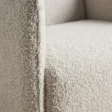 Close-up of the AirCush seat cushion, arm seam and textured upholstery