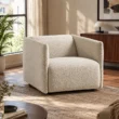 Off-white AirCush deep-seat armchair styled in a warm modern living room