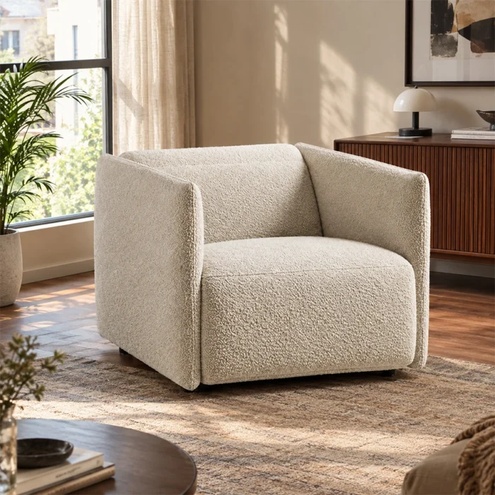 Off-white AirCush deep-seat armchair styled in a warm modern living room