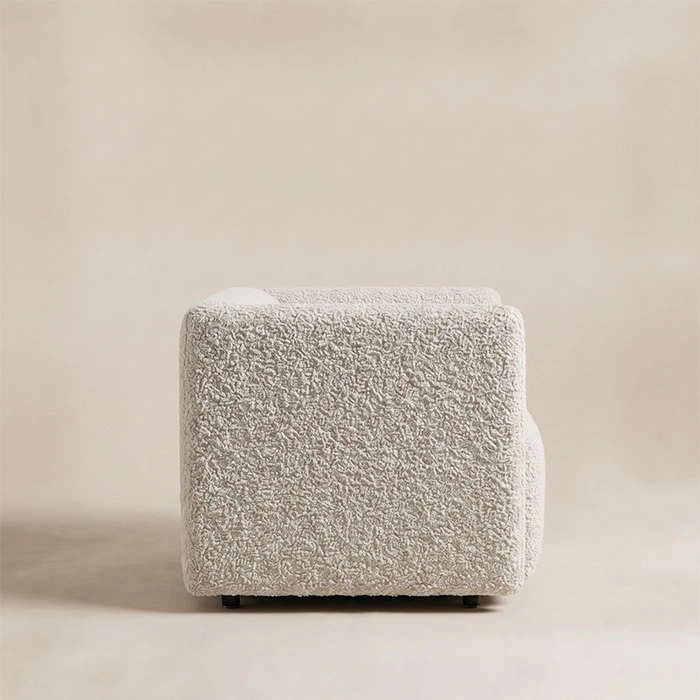 aircush-deep-seat-armchair-off-white-side-view. Side view of the AirCush armchair showing its deep seat and broad upholstered arm