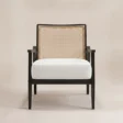 Front view of Cane Sculpt Armchair with white seat and natural cane back