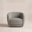 Front view of CreamCove curved armchair in textured grey upholstery