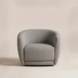 Front view of CreamCove curved armchair in textured grey upholstery