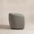 Side view of the CreamCove curved armchair in grey upholstery