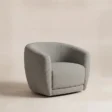 CreamCove curved armchair in grey shown from a three-quarter angle