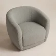 Elevated view of the CreamCove curved armchair with rounded arms and deep seat