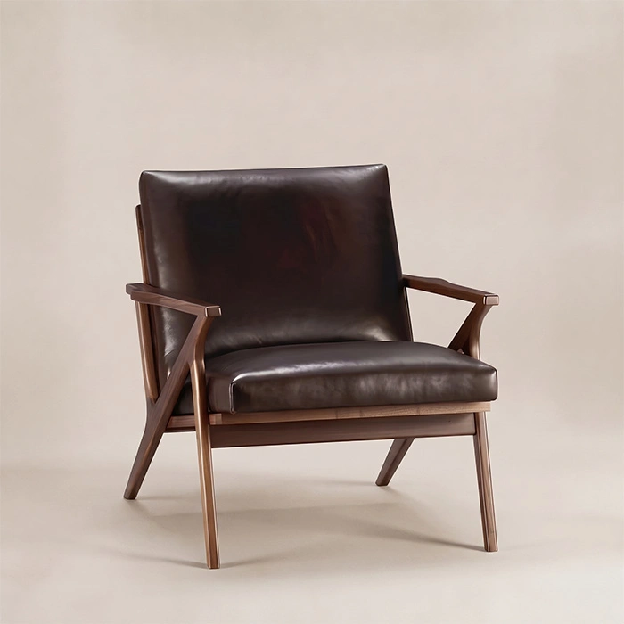 Fiora Mid-Century Armchair in dark brown upholstery, angled front view
