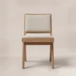 Front view of the Noble dining chair with cream upholstered seat and back