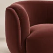 Close-up of UmberHush Armchair padded arm, upholstery and seat detail