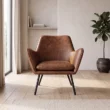 Varden Lounge Armchair in cognac brown upholstery styled in a modern living room