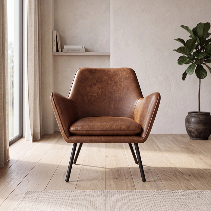 Varden Lounge Armchair in cognac brown upholstery styled in a modern living room