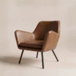 Varden Lounge Armchair in cognac brown upholstery shown from a three-quarter angle