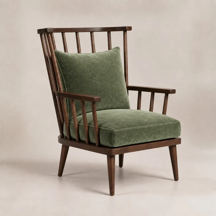 Windsor Nest spindle armchair with green upholstery and dark wood frame