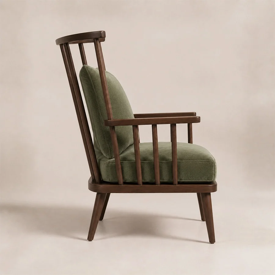windsor-nest-spindle-armchair-side-angle-view. Side angle showing the Windsor Nest armchair’s tall spindle back and wooden arms