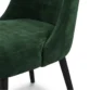 close view of chair showing green velvet upholstery