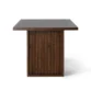 side profile view showing flutted pannel of table