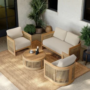 Meridian outdoor patio lounge set with sofas, chair, and round coffee table in outdoor setting