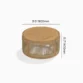 Meridian round teak outdoor coffee table with woven rope base front view