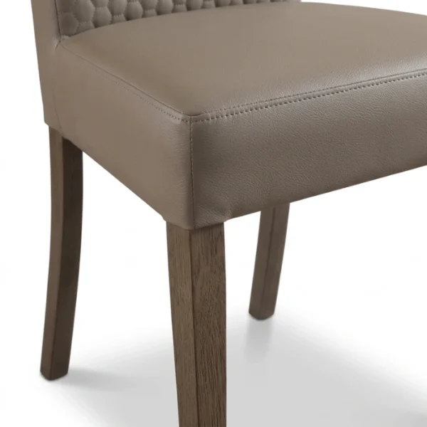Obsid Dining set - Chair (5) close view showing chair seat upholstery and wooden legs