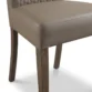 close view showing chair seat upholstery and wooden legs