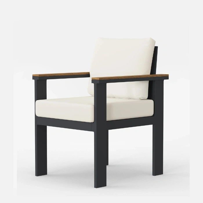 Angled view of cushioned patio dining chair with teak armrests, weather resistant outdoor furniture