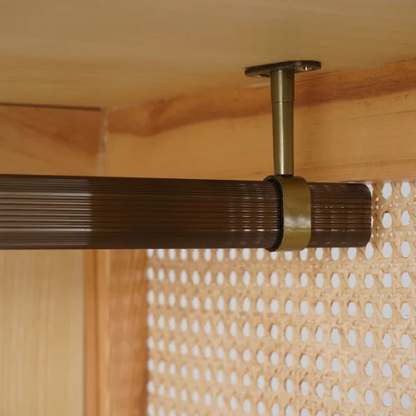 Rattanix Wardrobe (7) “Rattanix wardrobe clothes rail detail with metal hanging rod inside rattan cabinet