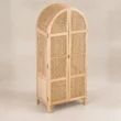 Elevated angled view highlighting the curved top and woven cane panels of Rattanix Wardrobe
