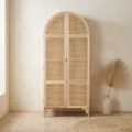 Rattanix rattan wardrobe in ash wood, full front view with arched cane doors