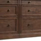 close view showing middle flutted pannel between drawers
