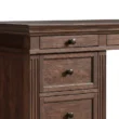 brown desk showing close view of drawers
