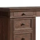 brown desk showing close view of drawers