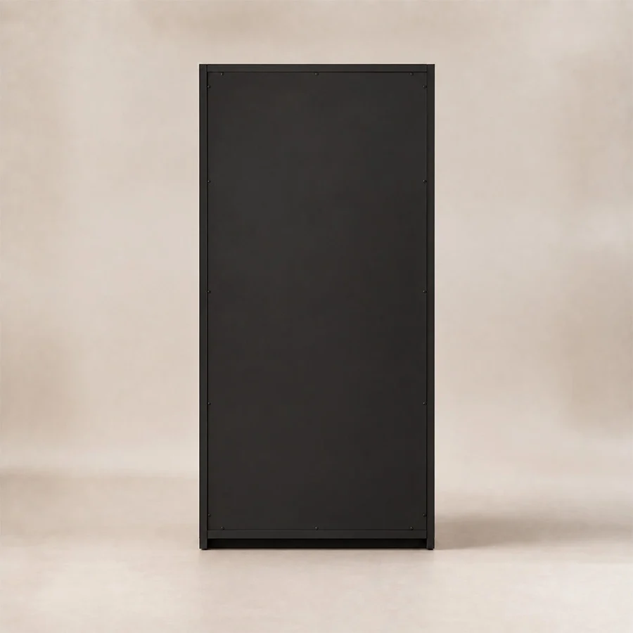 Rear view of the tall matte-black Tressel wardrobe