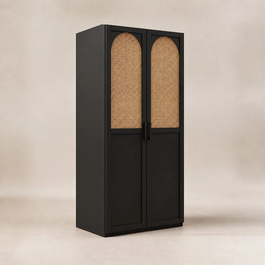 Angled view of black 2-door cane wardrobe with natural woven panels