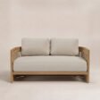 Front view of Meridian 2-seater outdoor sofa with neutral cushions