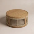 Meridian round outdoor coffee table showing Teak top and rope-woven sides