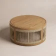 Meridian round outdoor coffee table showing Teak top and rope-woven sides