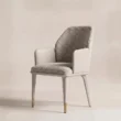 Upholstered SoftPier dining armchair shown at an angle