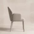 SoftPier dining armchair with curved back and slim legs, side view