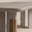 Close-up of the SoftPier table edge and decorative pedestal detail