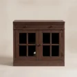 Front view of the Brown Wash cabinet with double glass doors and shallow drawer.