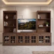 Stalwart Grand Media Console arranged around a wall-mounted TV in a spacious living room.
