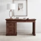 brown writing desk in simple offwhite background